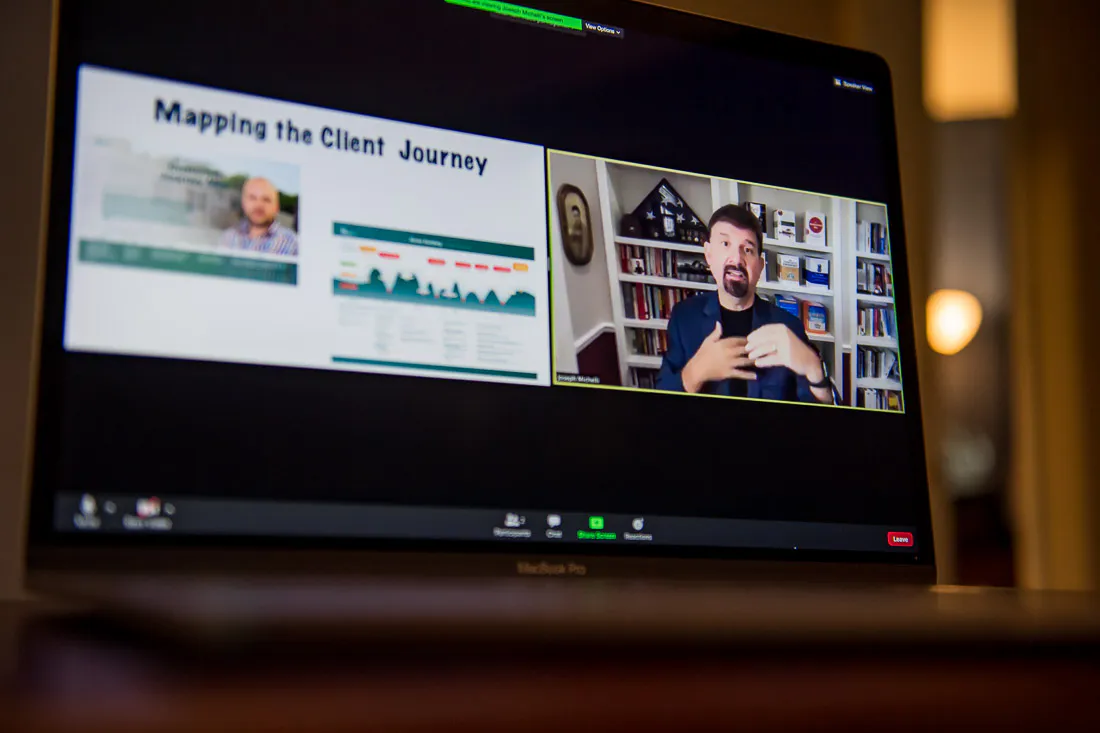 Joseph Michelli delivering a virtual presentation from his studio