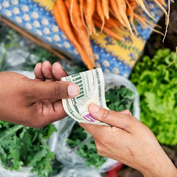 Farmer's market in St. Louis, Missouri, selling fresh and organic vegetables.